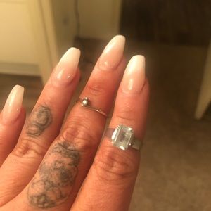 Sterling silver, diamond and blue stone rings.